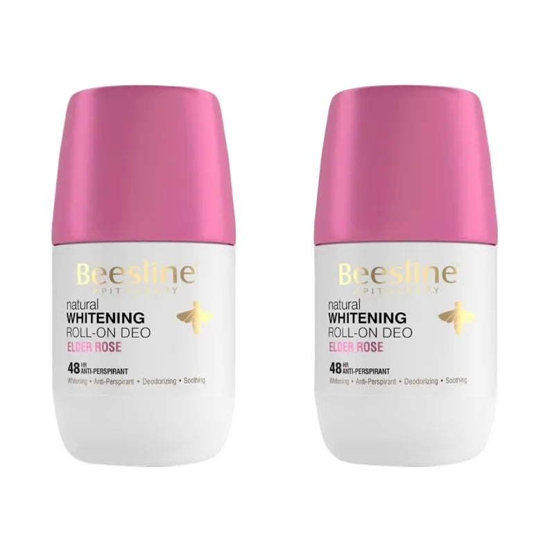 Two Beesline natural whitening roll-on deodorants with pink caps on a white background.