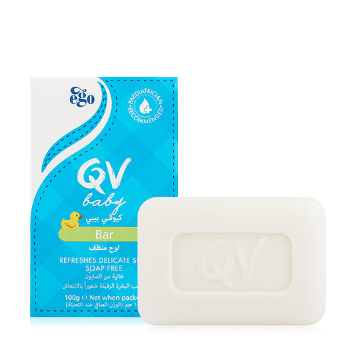 A bar of baby soap in an off-white color, shown next to its blue and white retail packaging box. The packaging features the brand name 'Ego' and 'QV baby' with a small yellow duck graphic.